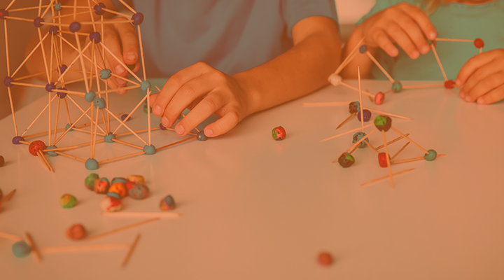 Children building with toothpicks